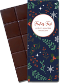 CHOCQLATE „Frohes Fest“ Schokolade 50 % mit Haselnussmus – Verpackung und Schokolade mit Haselnüssen