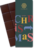 CHOCQLATE „Merry Christmas“ Schokolade 50 % mit Haselnussmus – Verpackung und Schokolade mit Haselnüssen