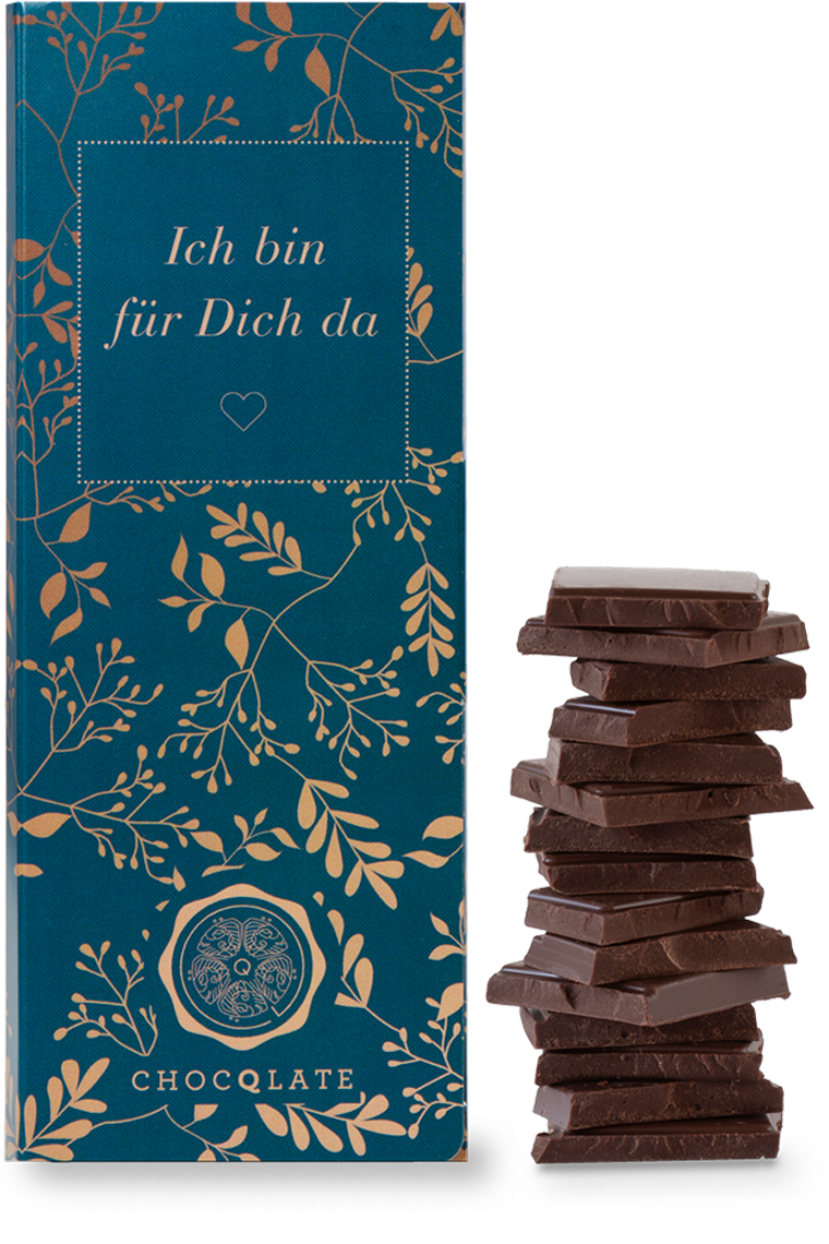 CHOCQLATE „Ich bin für Dich da“ Schokolade 50 % mit Haselnussmus – Verpackung, Schokoladenstücke und Haselnüssen