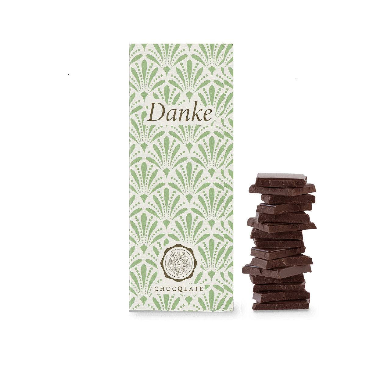 CHOCQLATE „Danke“ Schokolade 50 % mit Haselnussmus – Verpackung, Schokoladenstücke und Haselnüssen